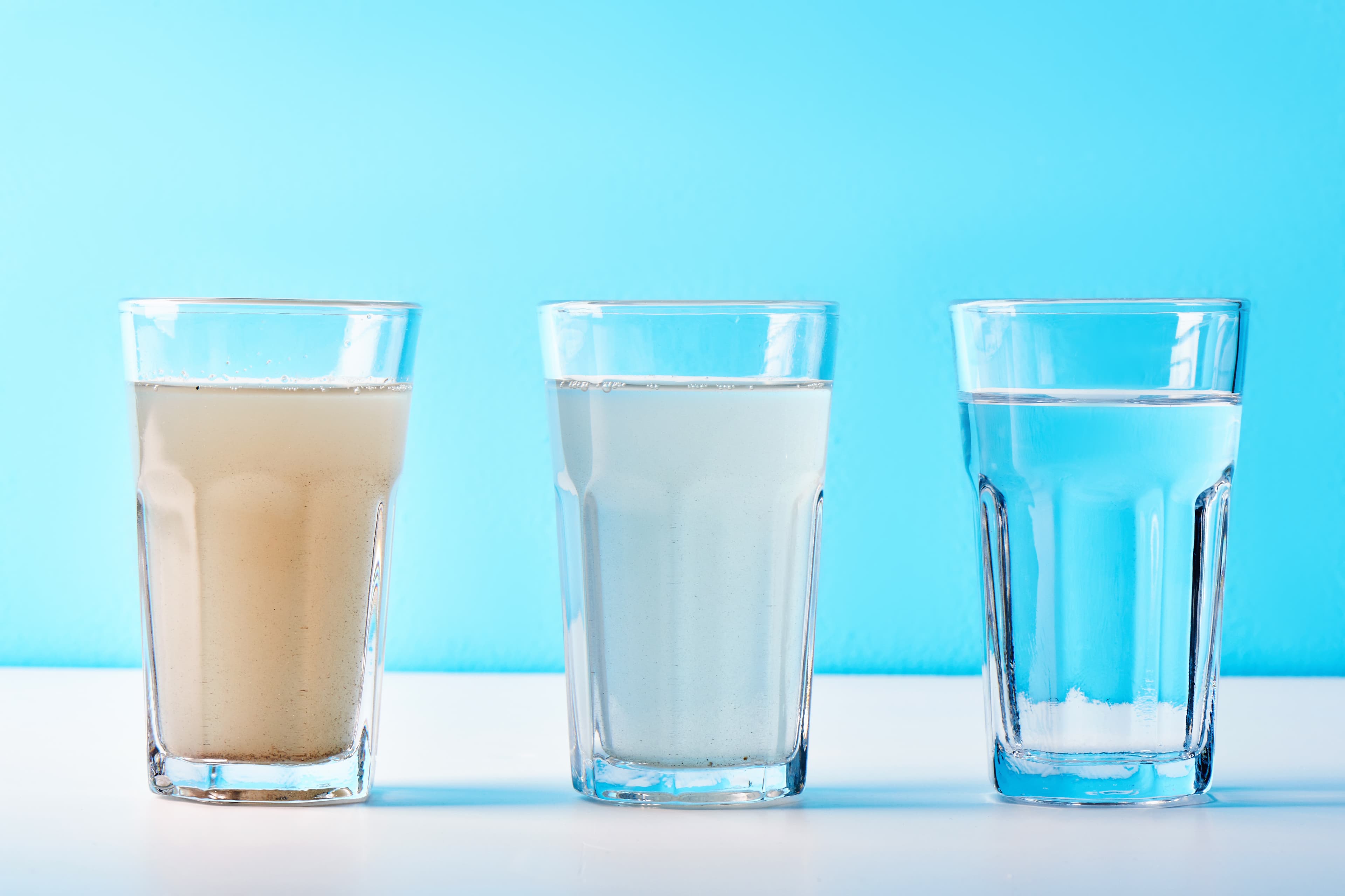 Before and after water filtration — dirty to clean water comparison